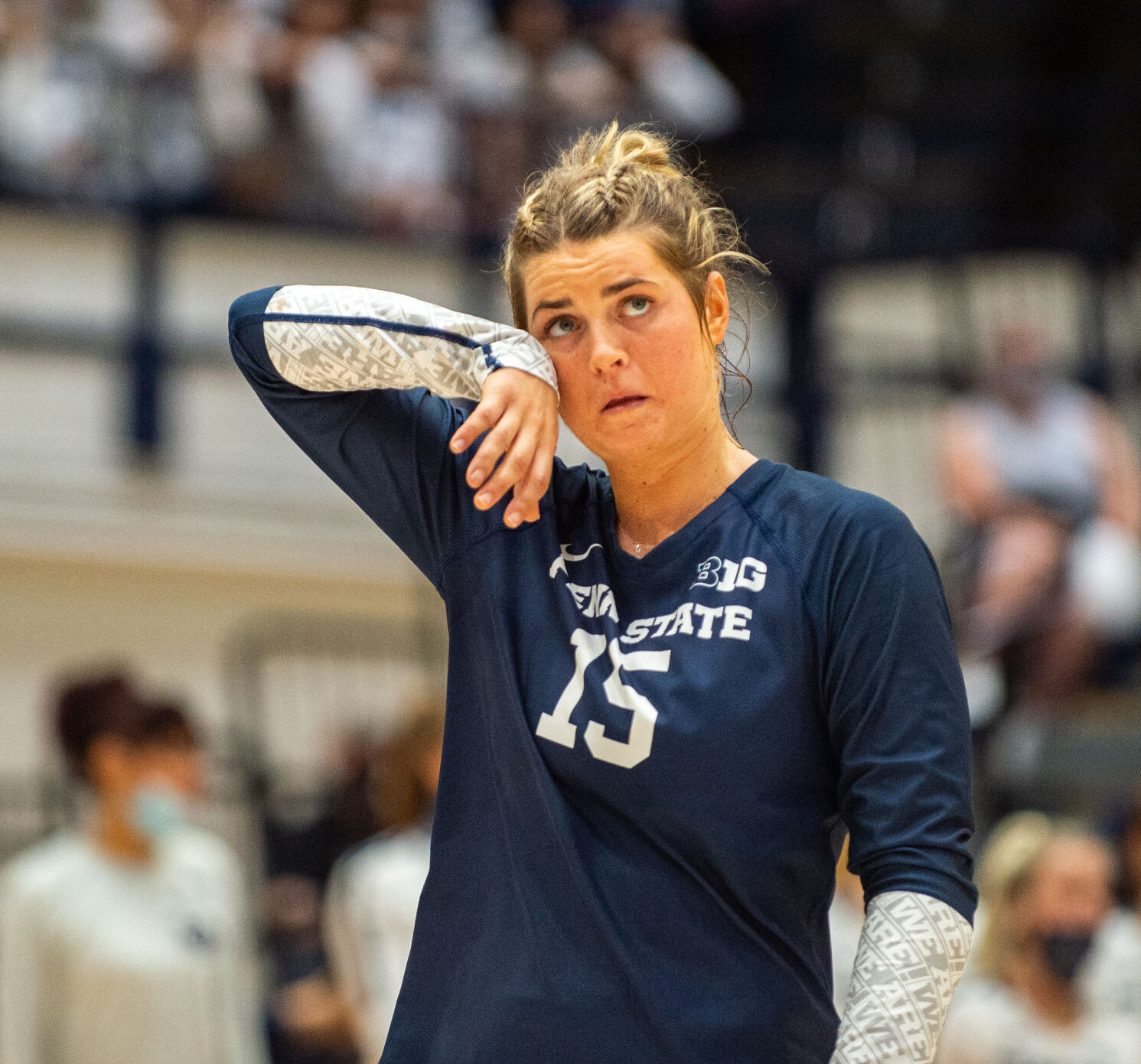 Jenna Hampton (15) wipes sweat from cheek at Penn State Nebraska match